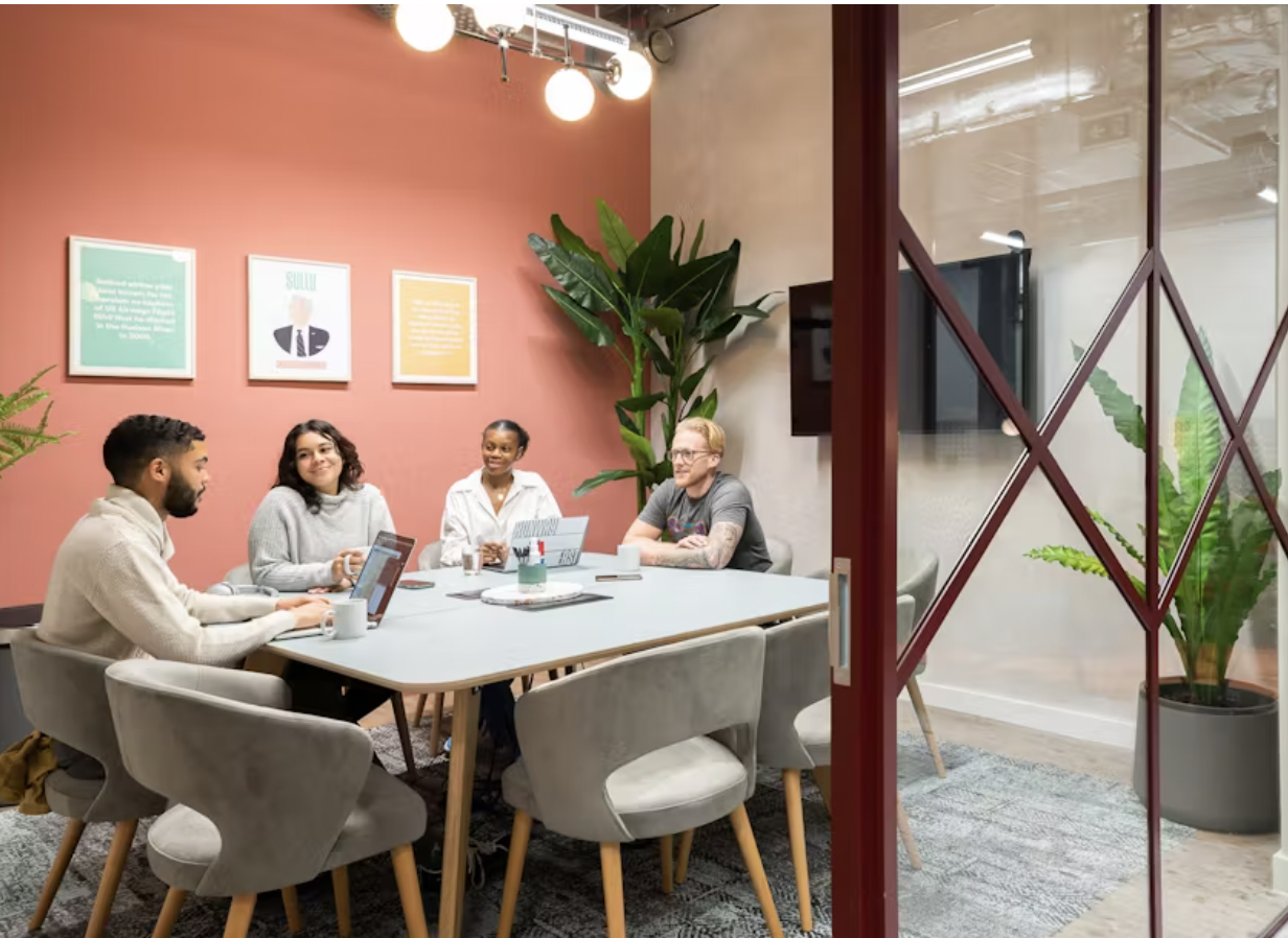 Contemporary meeting room with sleek table, ideal for creative collaboration.