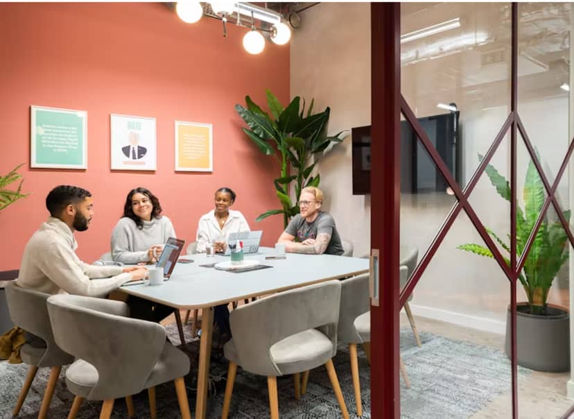 Contemporary meeting room with sleek table, ideal for creative collaboration.