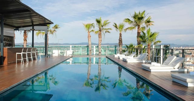 Rooftop venue at Fira de Barcelona with lounge seating for upscale cocktail and networking events.