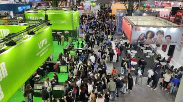 Saló de l'Ensenyament trade show with hanging signage at Fira Barcelona educational fair.
