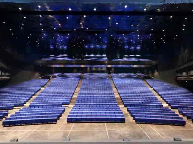Sala Auditori Barcelona: tiered auditorium with atmospheric lighting for plenary sessions or galas.