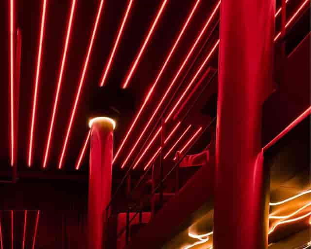 Mood-lit Sala Lux event venue for product launches and brand activations.
