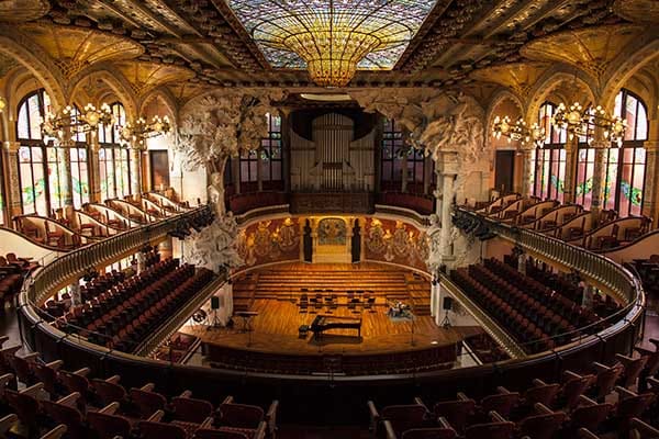 Ornate Palau de la Música Catalana auditorium for exclusive corporate gala and keynote events.