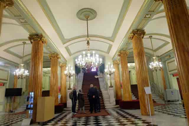 Neoclassical Gran Teatre del Liceu auditorium with grand staircase for gala events.
