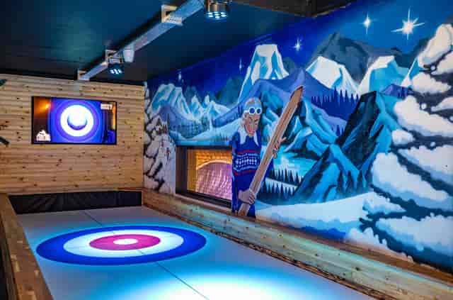 Vibrant curling-themed event space at Roxy Ball Room, Sheffield for team-building activities.