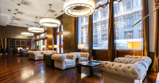 Sophisticated Hotel Colonial Barcelona lounge for networking and corporate events.