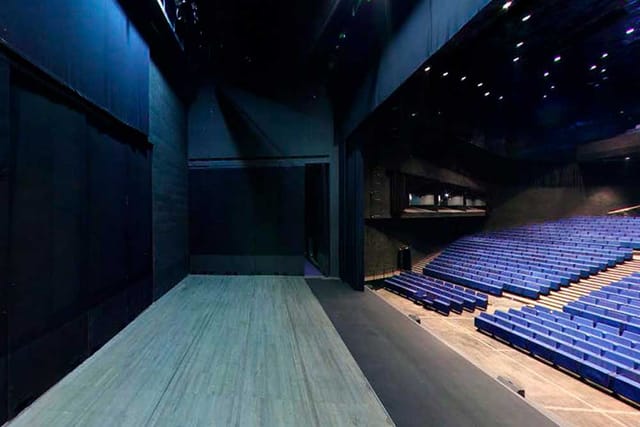 Modern auditorium stage at CCIB Barcelona for corporate presentations and keynote events.