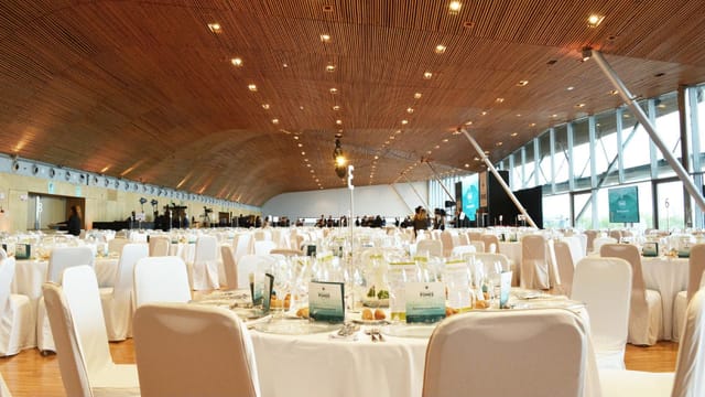 VIP room at CCIB Barcelona with wood-vaulted ceiling for corporate dinners and awards ceremonies.