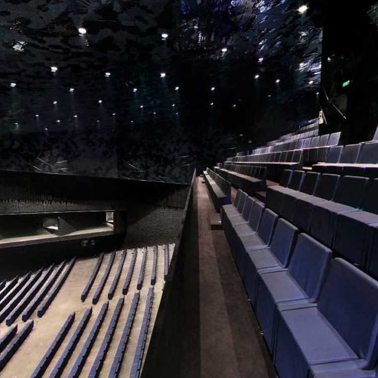 Modern tiered auditorium stage for professional keynote presentations and corporate events.