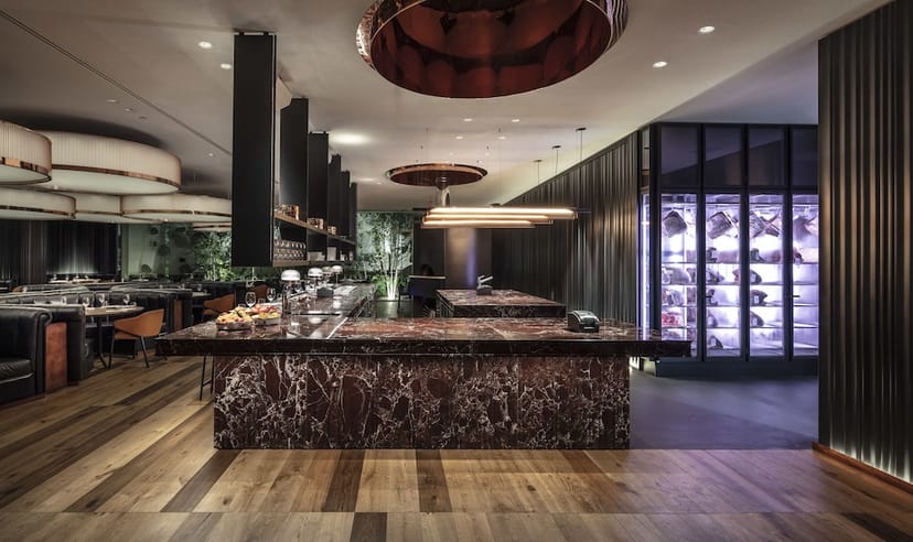 Luxury marble bar at Sir Victor Hotel for exclusive executive dinners and corporate events.
