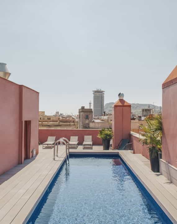 Rooftop terrace with pool at Aparthotel Arai for VIP receptions and boutique networking events.