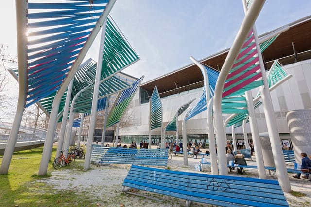 Outdoor breakout space at Barcelona International Convention Centre for professional networking.