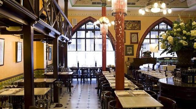 Atmospheric Barcelona restaurant venue with historic architecture for corporate and social events.