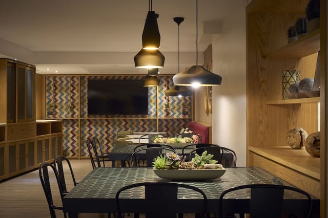 Contemporary industrial Gastrobar meeting room for collaborative workshops and business events.