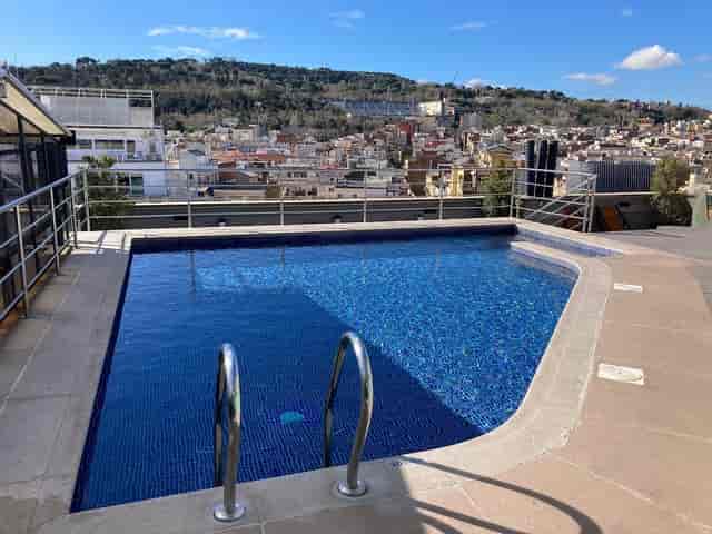Rooftop infinity pool venue at Hotel Barcelona Universal for corporate events and cocktail parties.