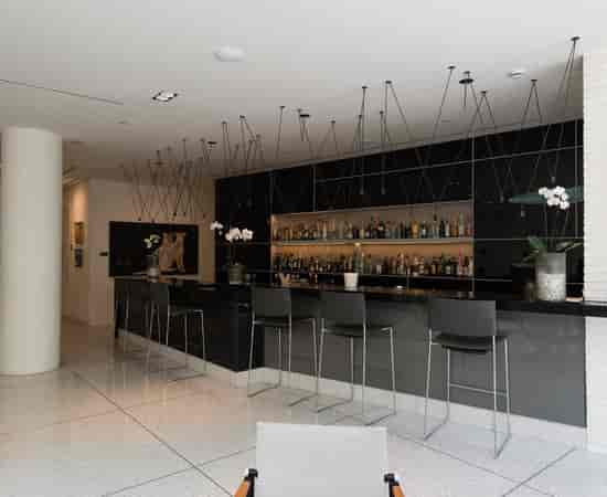 Contemporary hotel bar for intimate networking and premium corporate cocktail events.