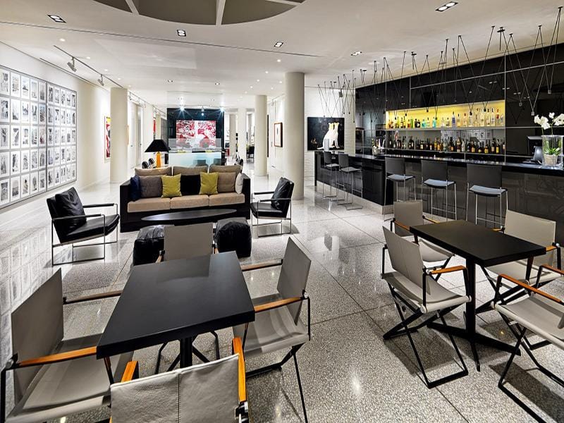 Sleek lounge bar with modern seating, ideal for upscale cocktail receptions and networking events.