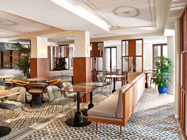 Modern break-out space at Restaurant Fauna, Kimpton Vividora for corporate networking and meetings.