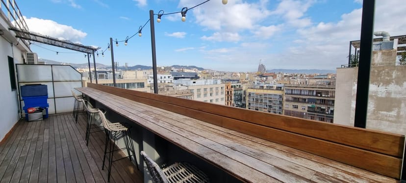 Rooftop terrace with city views, ideal for networking reception and corporate cocktail events.