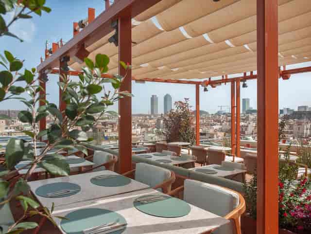 Rooftop terrace at Grand Hotel Central with city views for VIP networking and cocktail events.