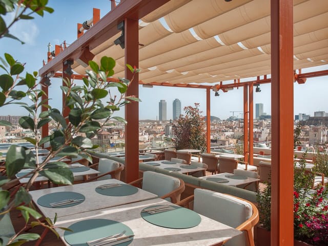 Rooftop terrace at Grand Hotel Central with city views for VIP networking and cocktail events.