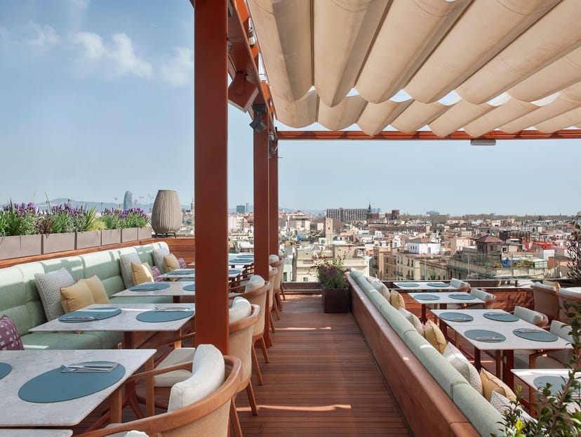 Restaurant Can Bo rooftop lounge with city skyline view for corporate networking and receptions.