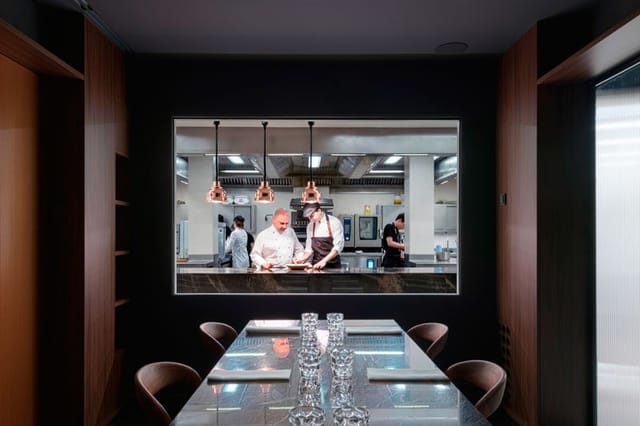 Semi-private dining room at Cinc Sentits for executive retreats and corporate hospitality events.