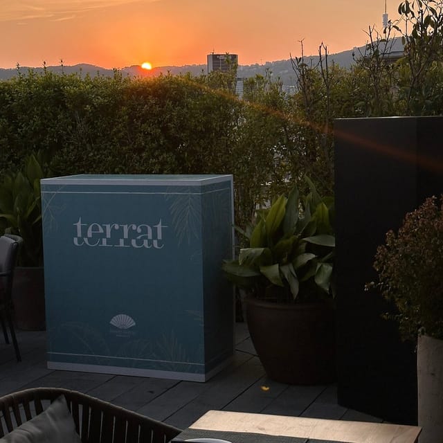 Branded event podium at Terrat rooftop for corporate receptions and luxury networking.