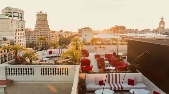 Almanac Barcelona rooftop lounge with city views for networking reception or VIP cocktail hour.
