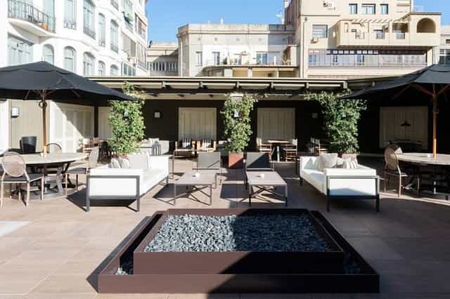 Business Center open-air event space with fire pit for cocktail receptions and networking.