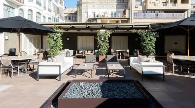 Hotel Granvia library lounge with fire pits for outdoor networking and corporate event receptions.