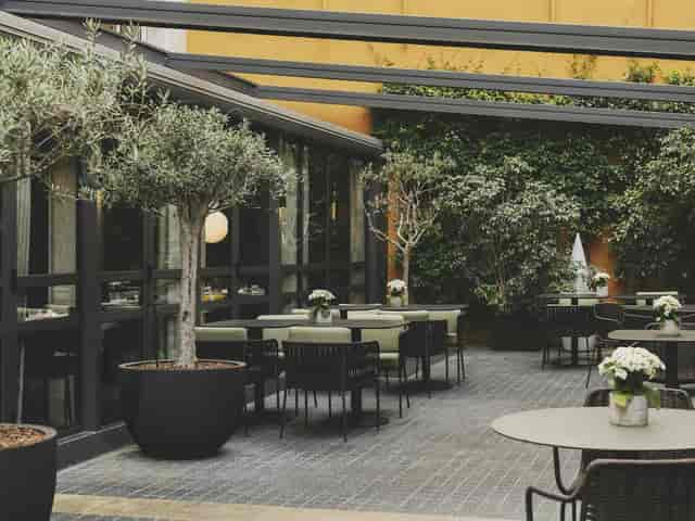 Robert at a Gallery Hotel Barcelona outdoor terrace, ideal for corporate events and networking.