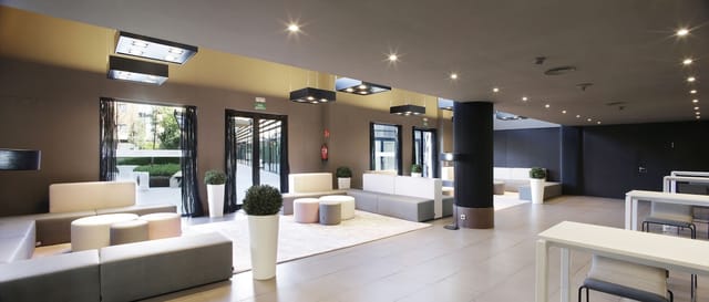 Hotel Alimara lobby with modular lounge seating for business networking and corporate events.