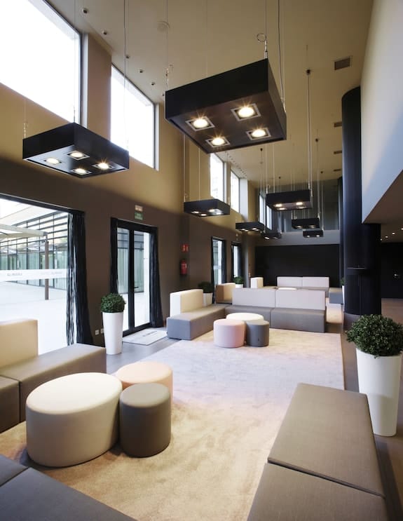 Modern Hotel Alimara lobby with modular seating for networking and corporate events.