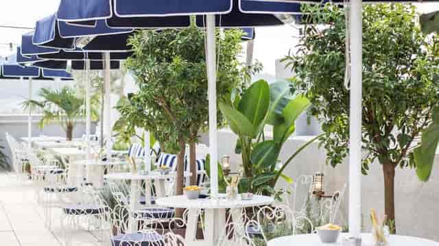 Rooftop terrace restaurant at Hotel Midmost for corporate networking and social events.