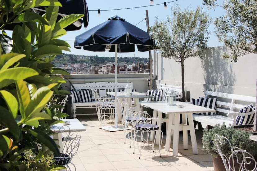 Rooftop terrace at Hotel Midmost with bistro seating for networking events and private brunches.