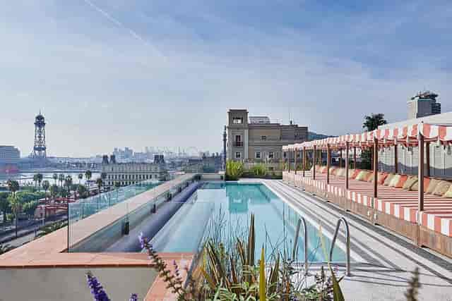 Soho House Barcelona rooftop terrace with infinity pool for upscale networking and product launches.