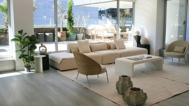Sophisticated executive retreat lounge with terrace access, ideal for high-end corporate events.