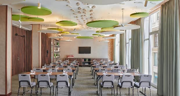 Atelier 1+2 classroom setup at Hyatt Centric Madrid for corporate training and seminars.