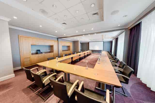 Sheraton Grand Warsaw boardroom: U-shape setup with AV for corporate workshops and meetings.