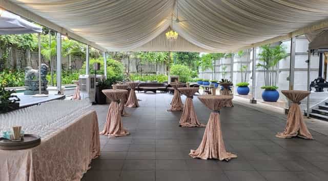 Elegant outdoor event space in East Garden, The Fullerton Hotel Singapore for receptions and gatherings.