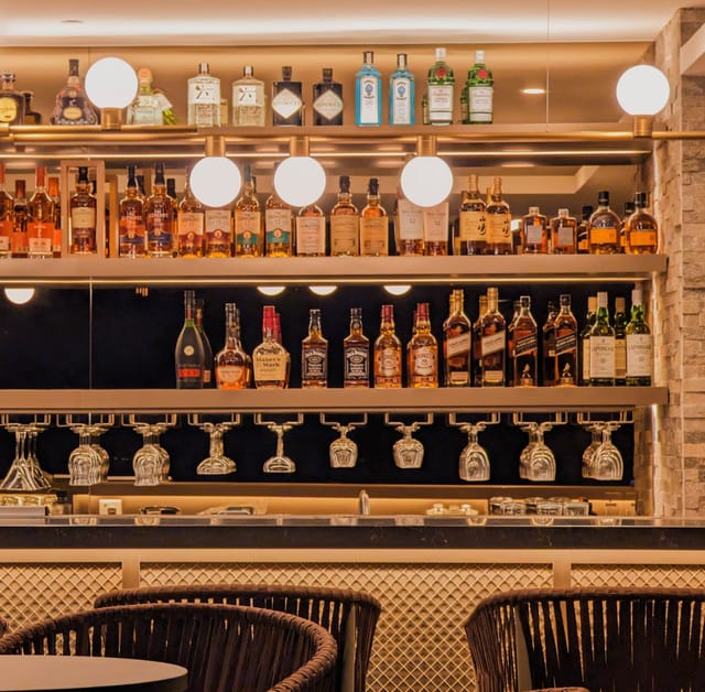 Cooling Tower Rooftop Bar in Singapore featuring premium spirits for corporate networking events.