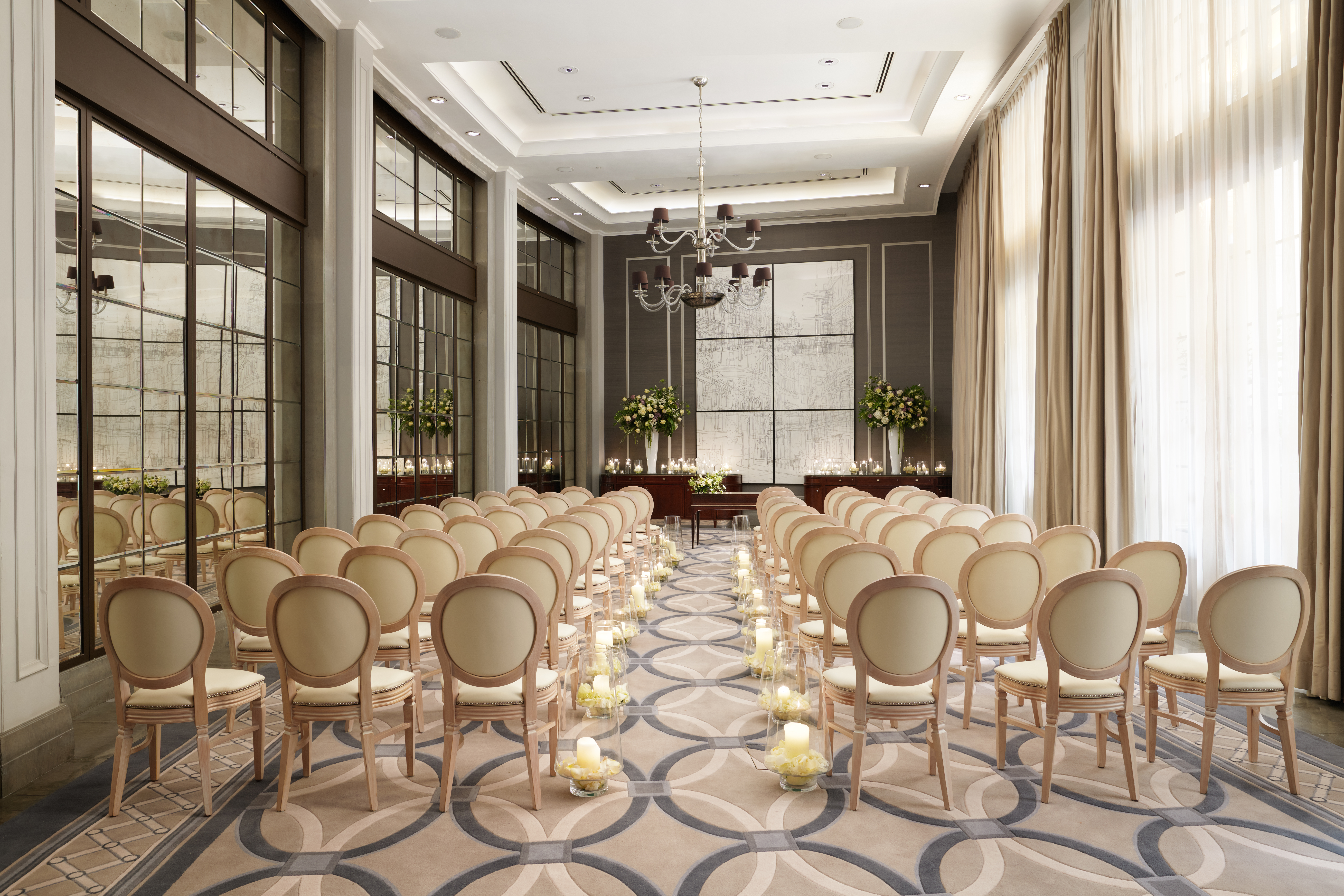 Sophisticated event space in Corinthia London with elegant seating for meetings and ceremonies.