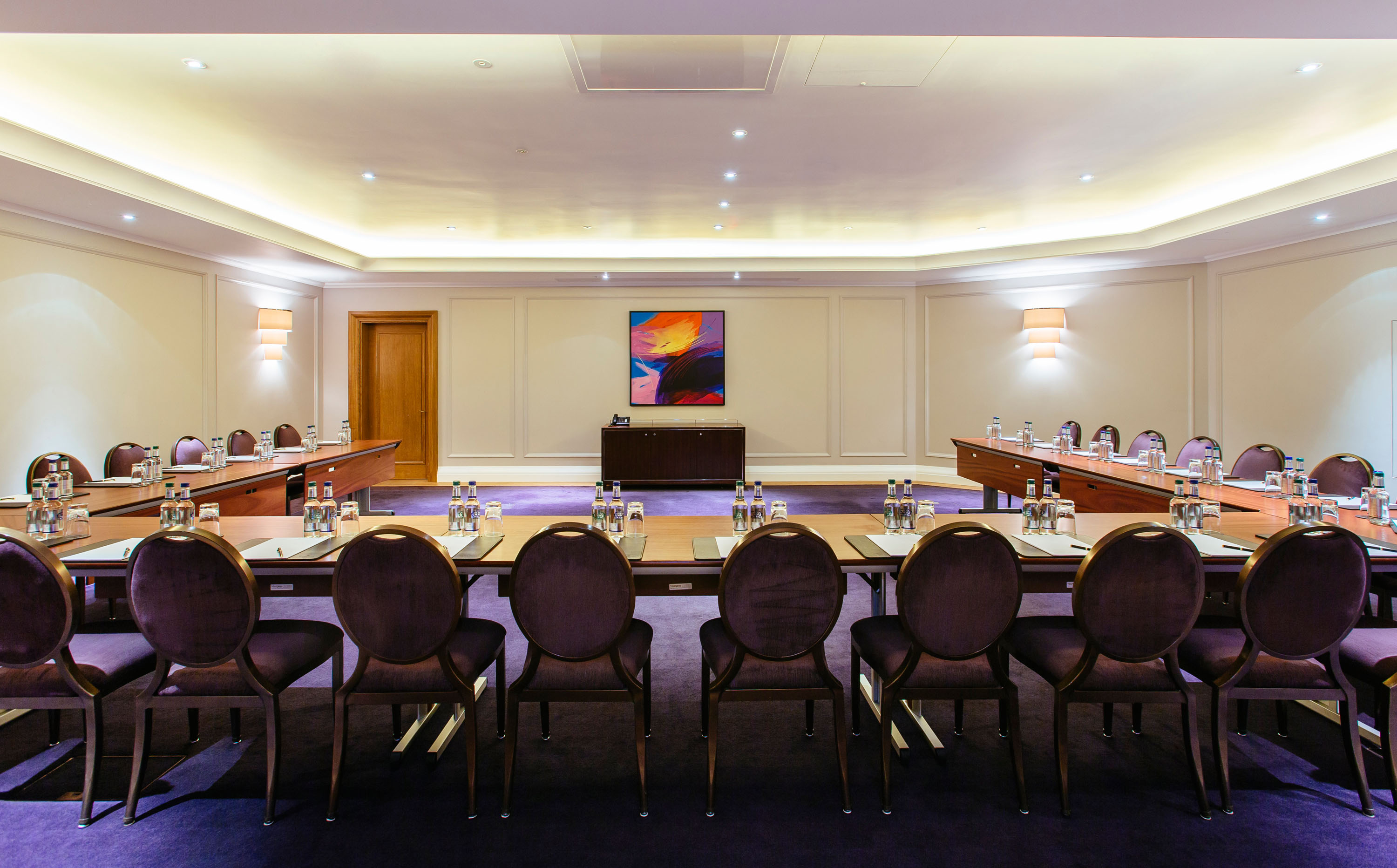 The Nelson Room at Corinthia London, featuring elegant U-shape seating for meetings and events.