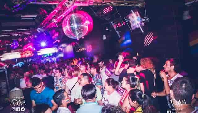 Disco ball and truss lighting in a high-energy nightclub party event setup.