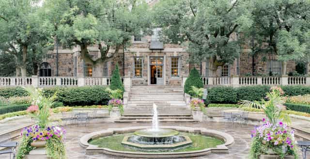 Garden ceremony at Graydon Hall Manor featuring lush landscaping for elegant outdoor weddings.