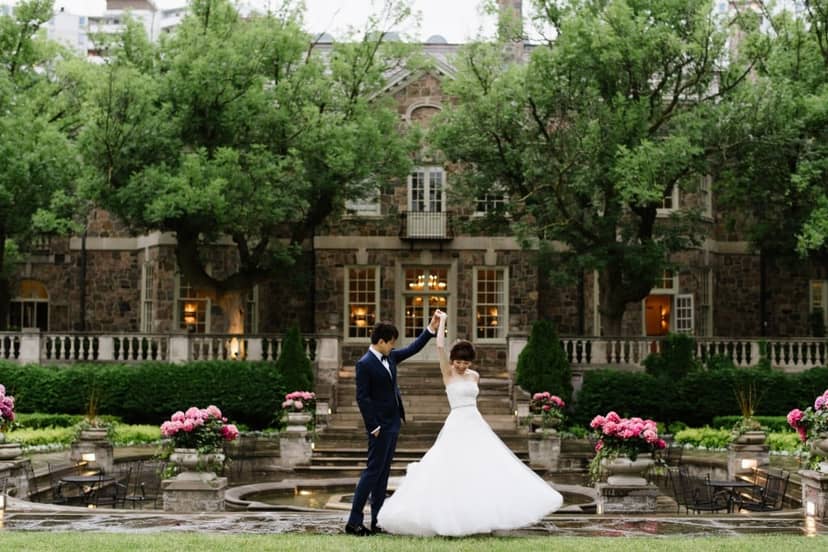 Graydon Hall Manor estate garden wedding ceremony with elegant water feature and landscape.