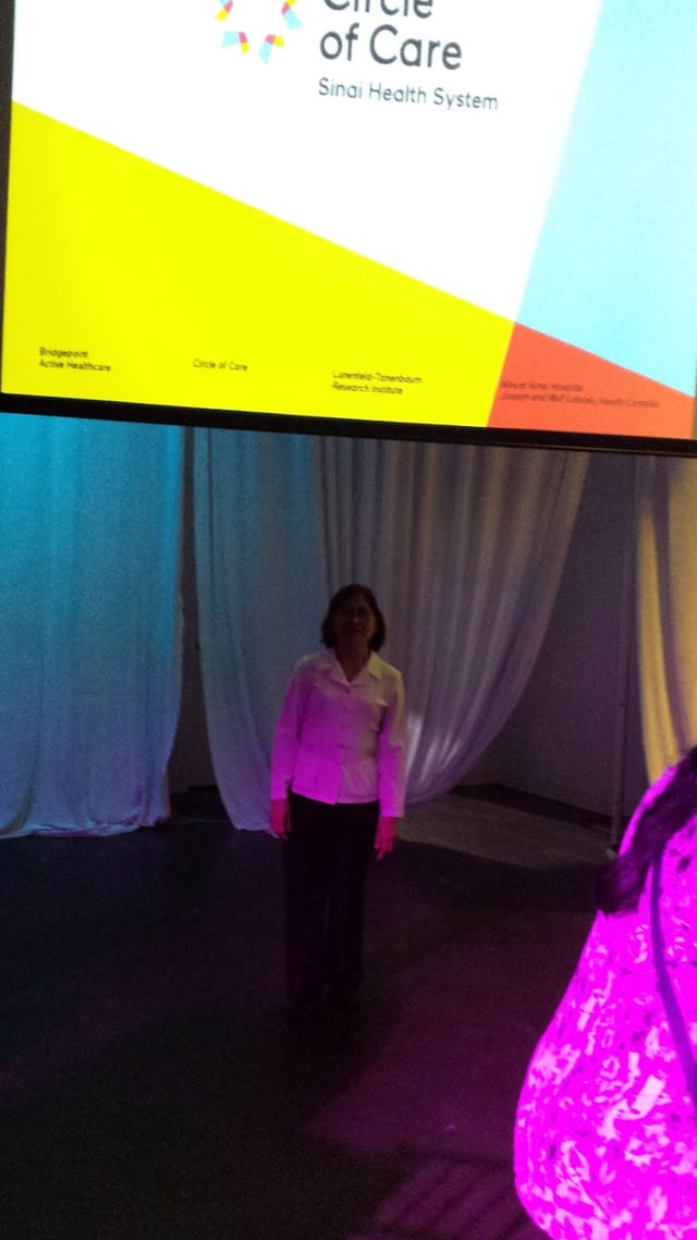 Warehouse event venue stage with pipe-and-drape for corporate conferences and live music.