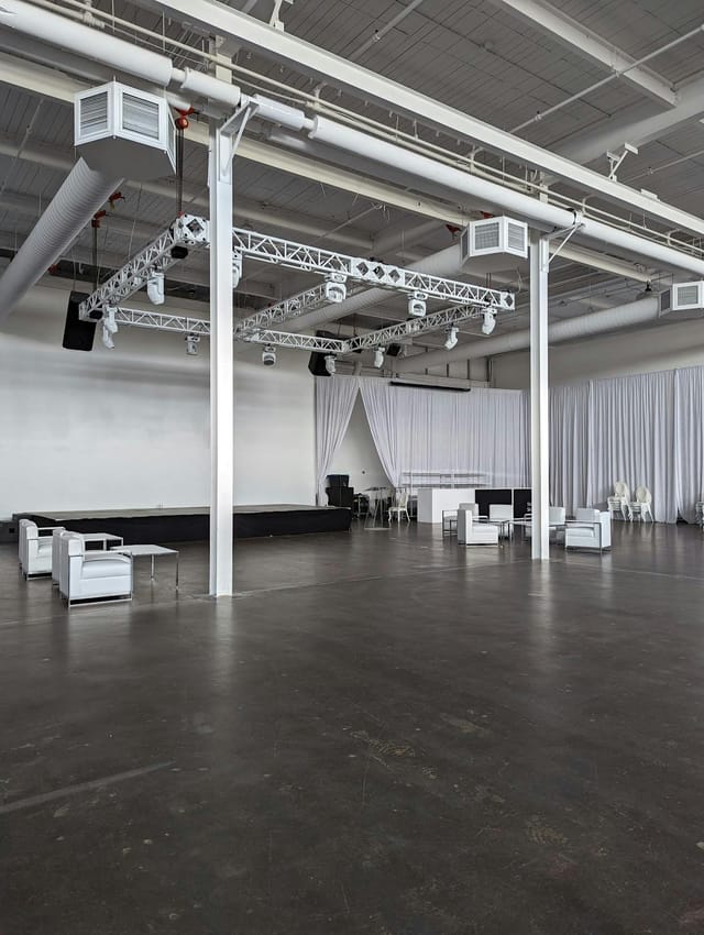 Industrial-chic banquet hall at The Warehouse Venue, ideal for corporate events and product launches.