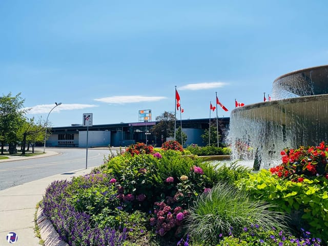 Better Living Centre exterior with flags, perfect for regional conventions and trade events.